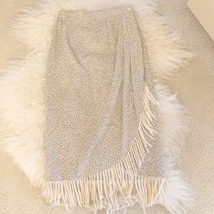 Wrap around skirt. Cream fringe. Animal print
